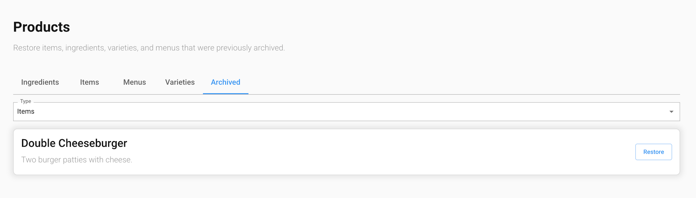 The Archived tab of the Products screen in the GrubStack Core dashboard, showing an archived item with a Restore button
