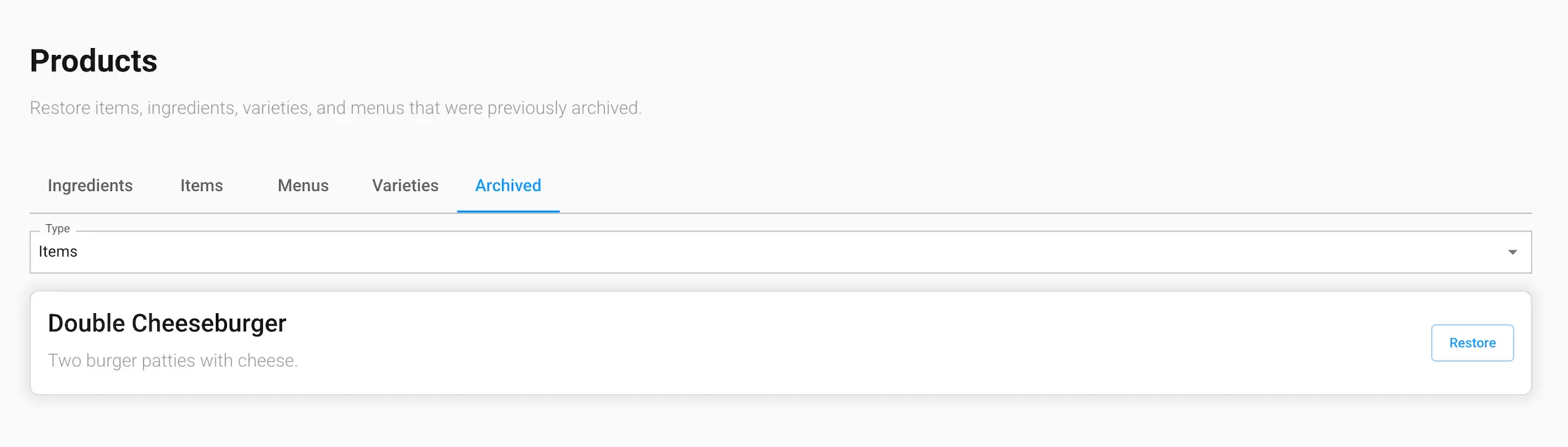 The Archived tab of the Products screen in the GrubStack Core dashboard, showing an archived item with a Restore button