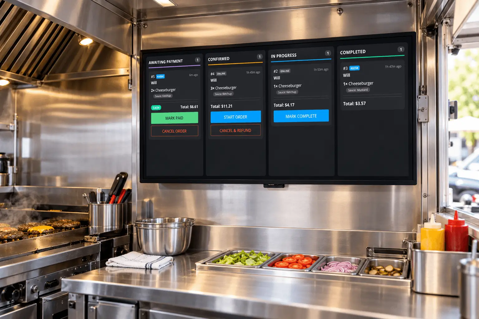 A touchscreen kitchen display running GrubStack Terminal, mounted above a prep station